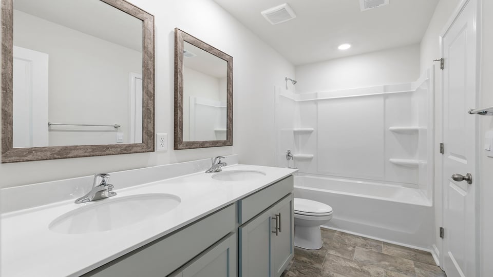 Bathroom with vanity and tub.