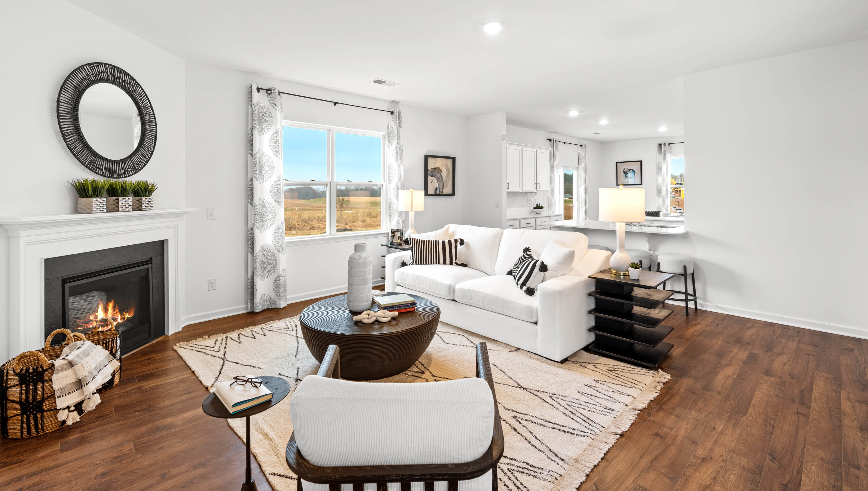 Family room with fireplace and windows.