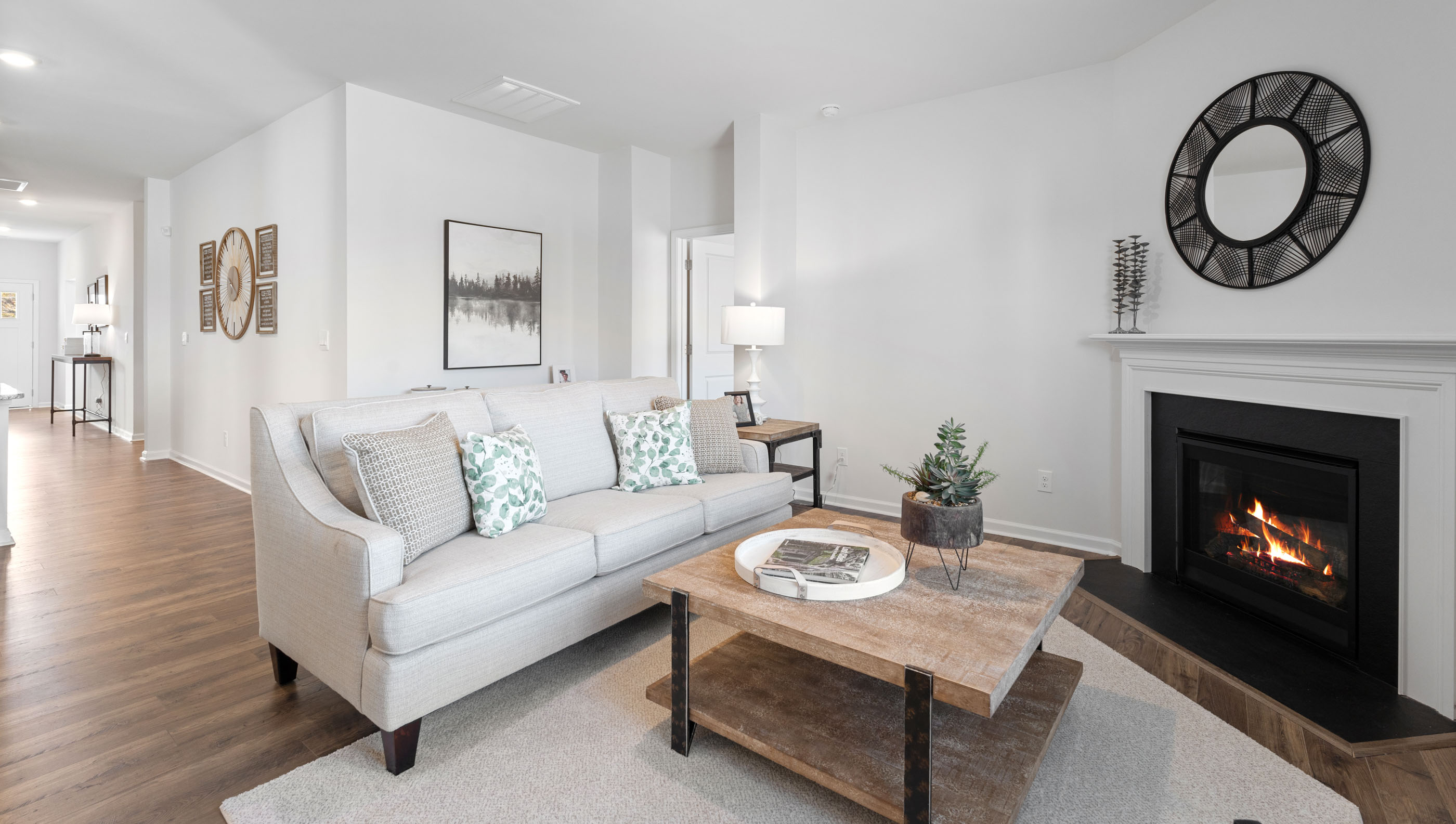 Livingroom with firplace and windows.