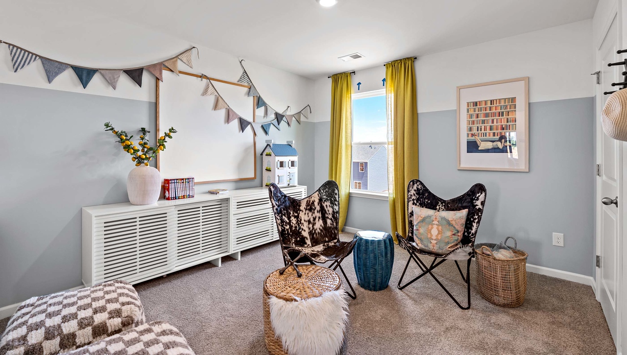 Bedroom with carpet and window.