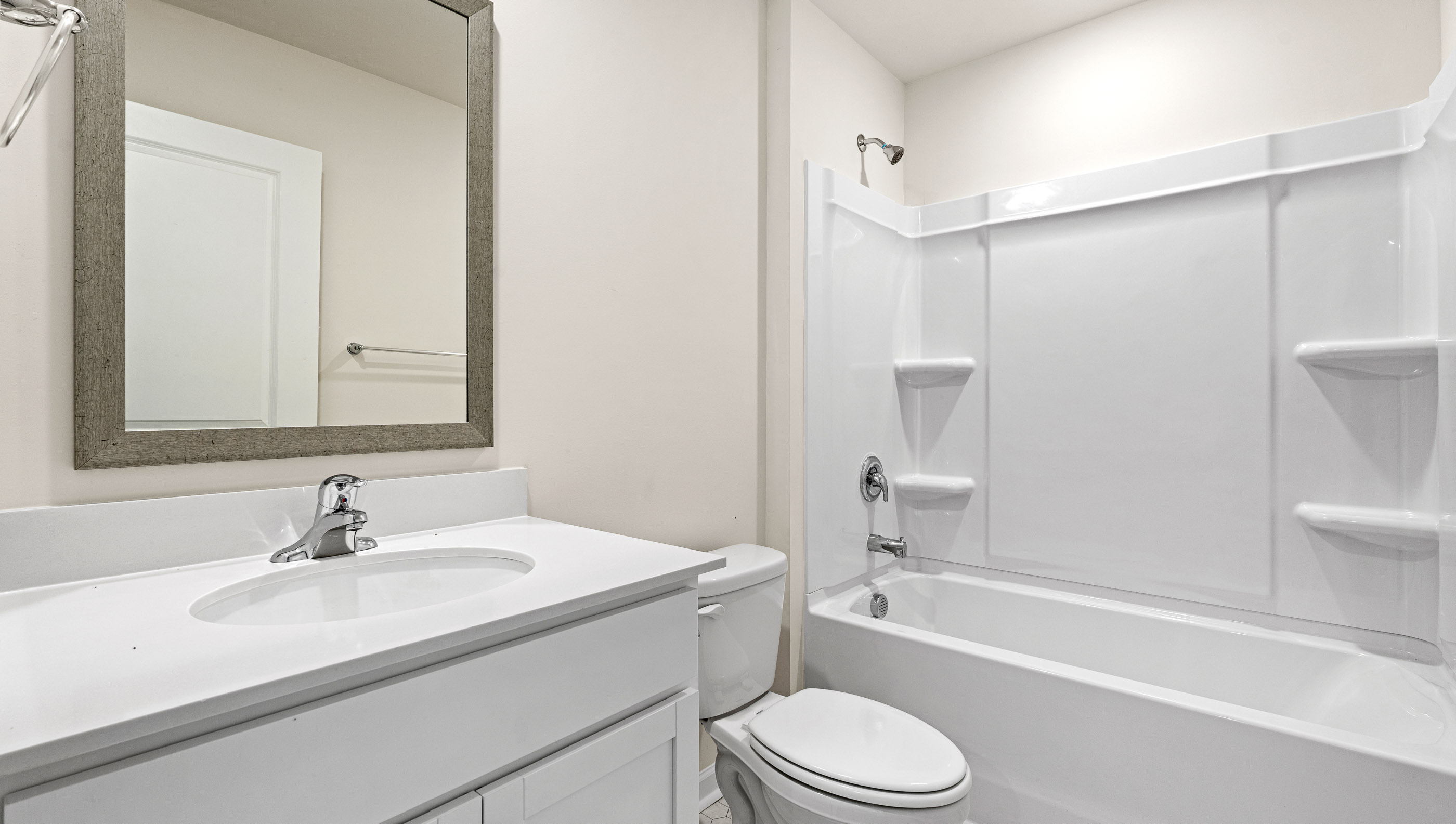 Bathroom with vanity and tub.