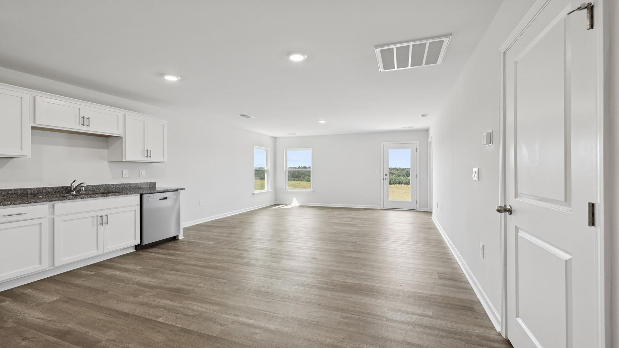 Kitchen facing living room.