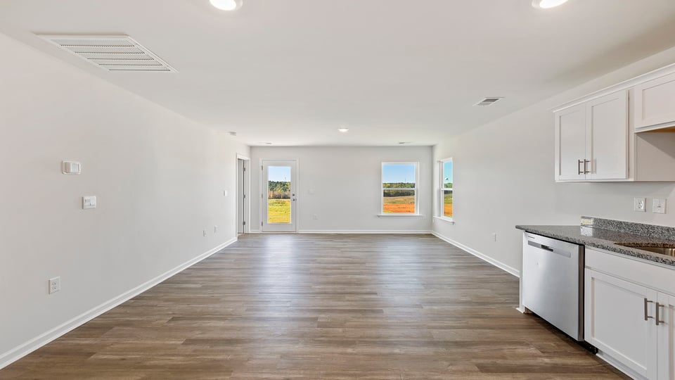 Family room with windows.
