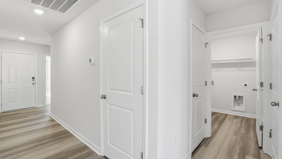 Hallway of home to kitchen.
