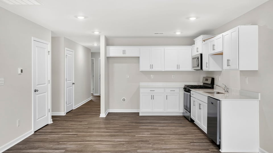 Kitchen with stainless steel appliances.