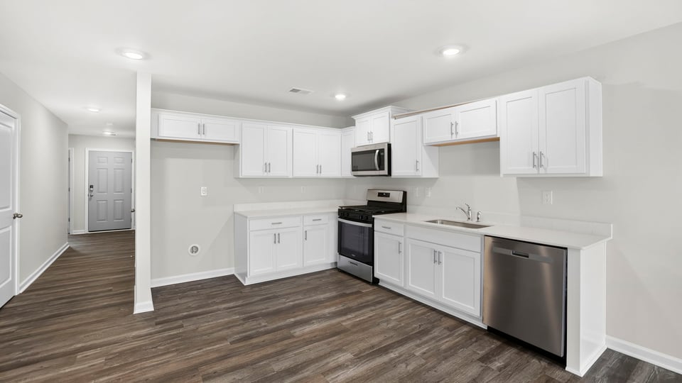 Kitchen with stainless steel appliances.
