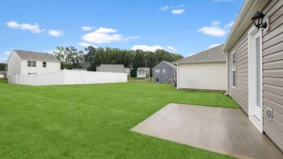 Patio at rear exterior of home.