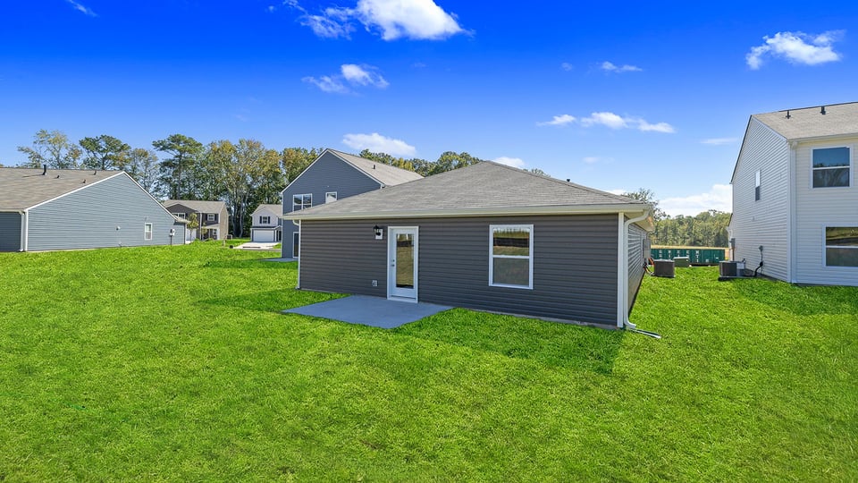 Large backyard of home.