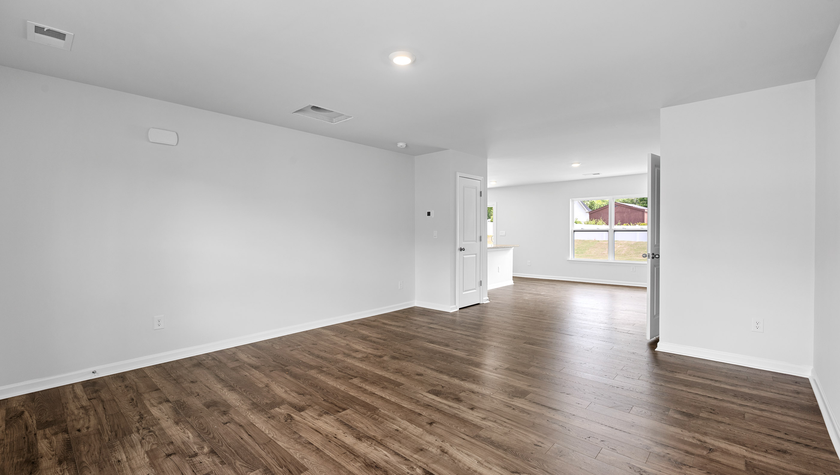 Family room looking towards back of home.
