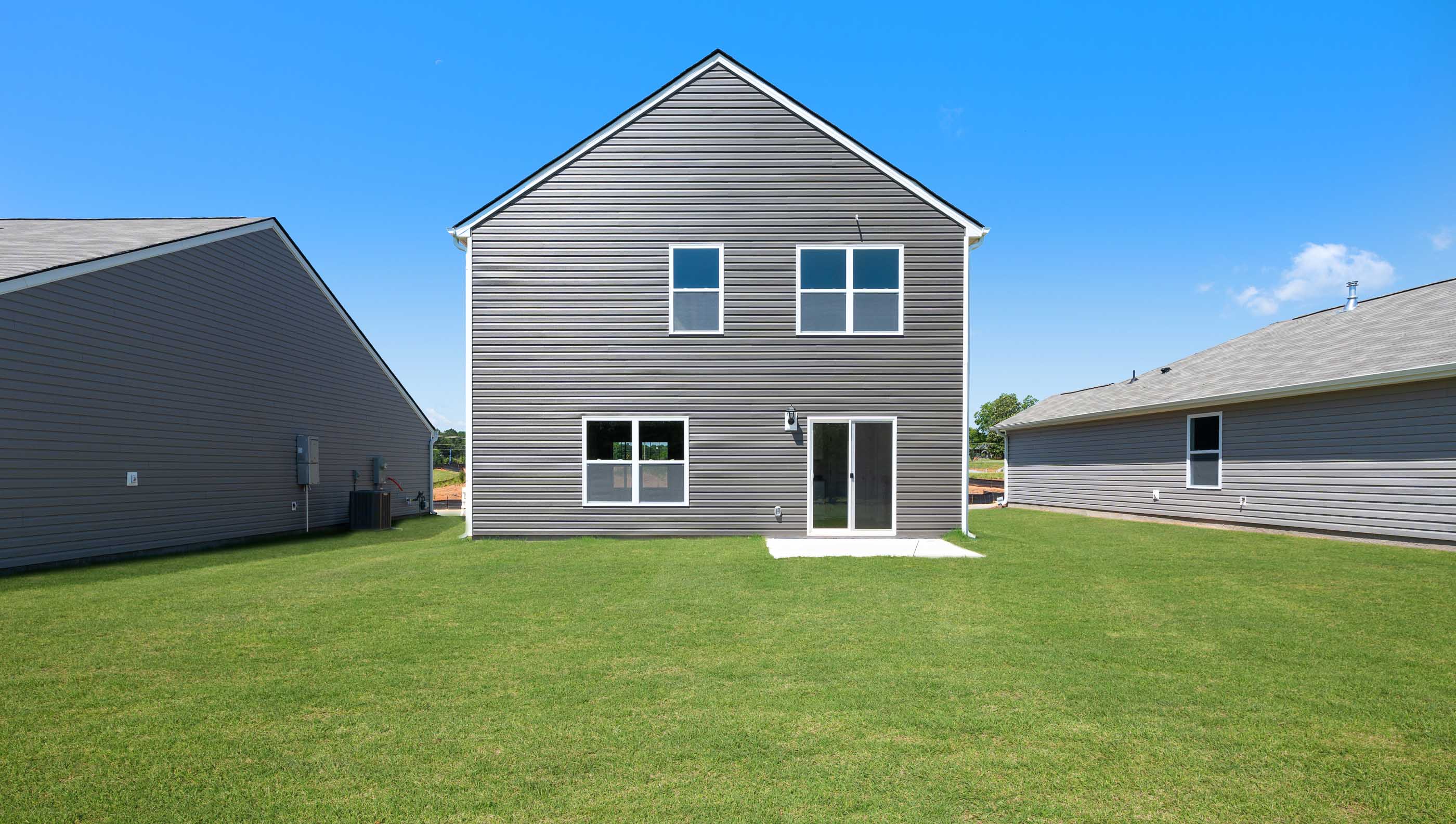 Large backyard of home.