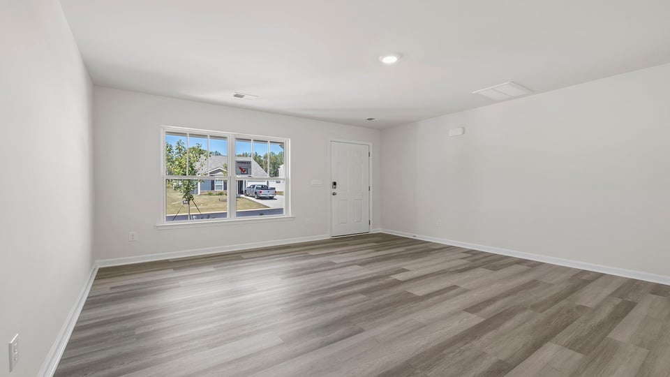 Family room with windows.