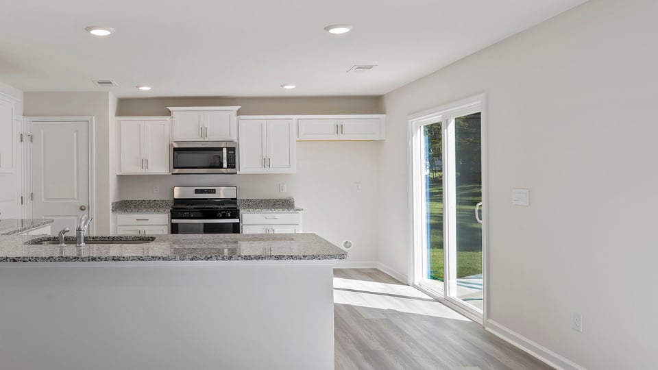 Kitchen with sliding door.