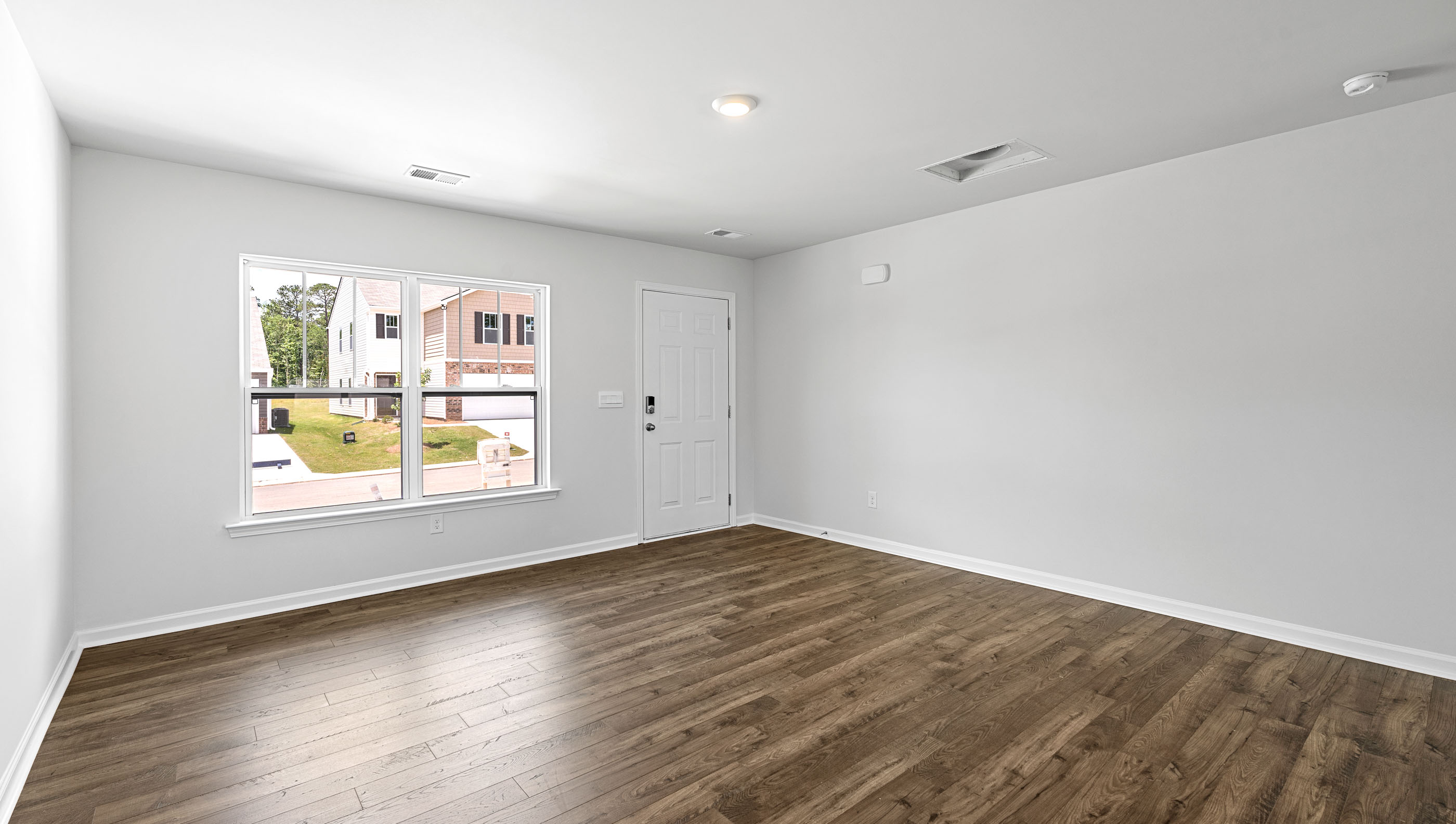 Family room with windows.
