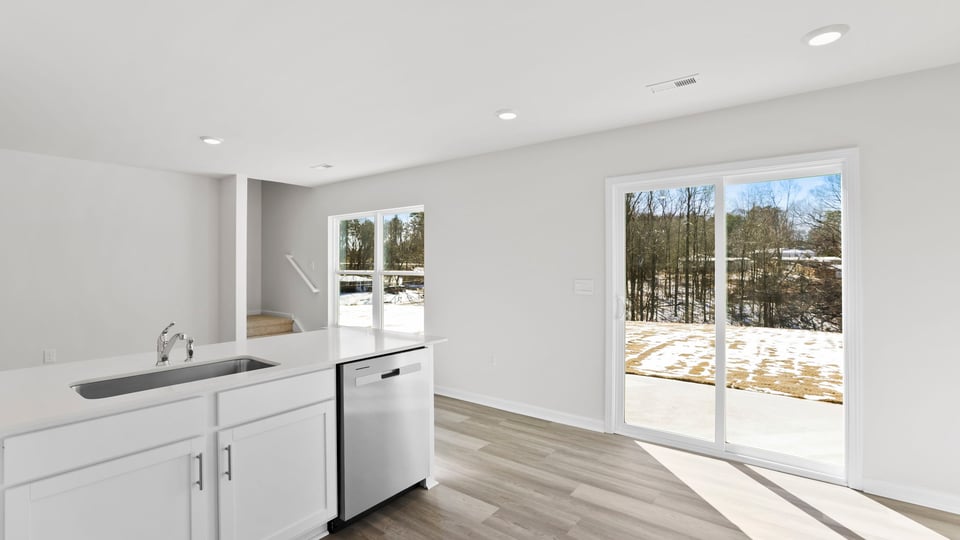 Kitchen with quartz countertops.