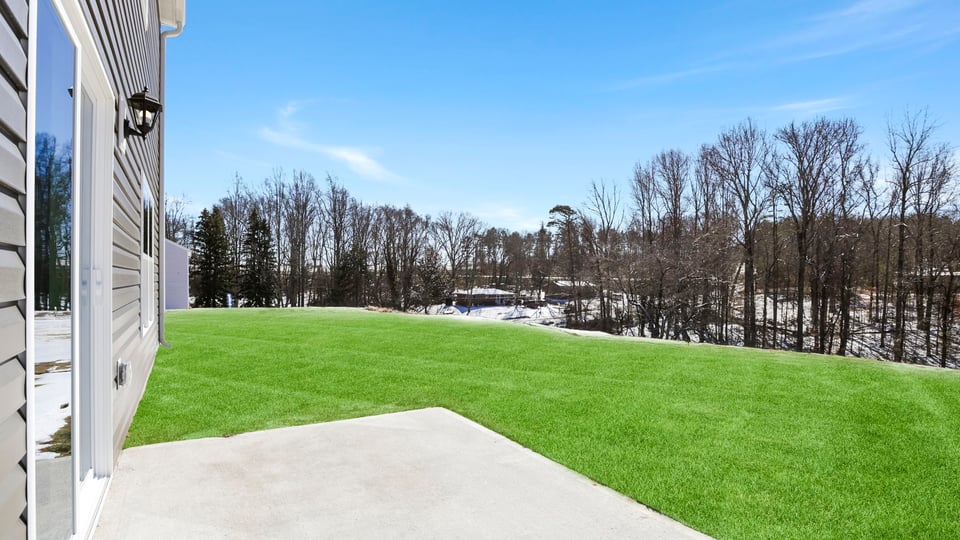 Large backyard of home.