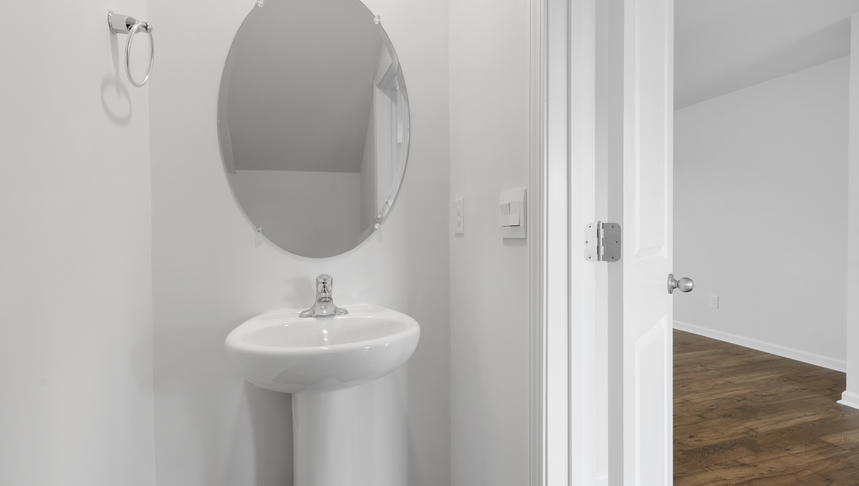 Half bathroom with vanity.