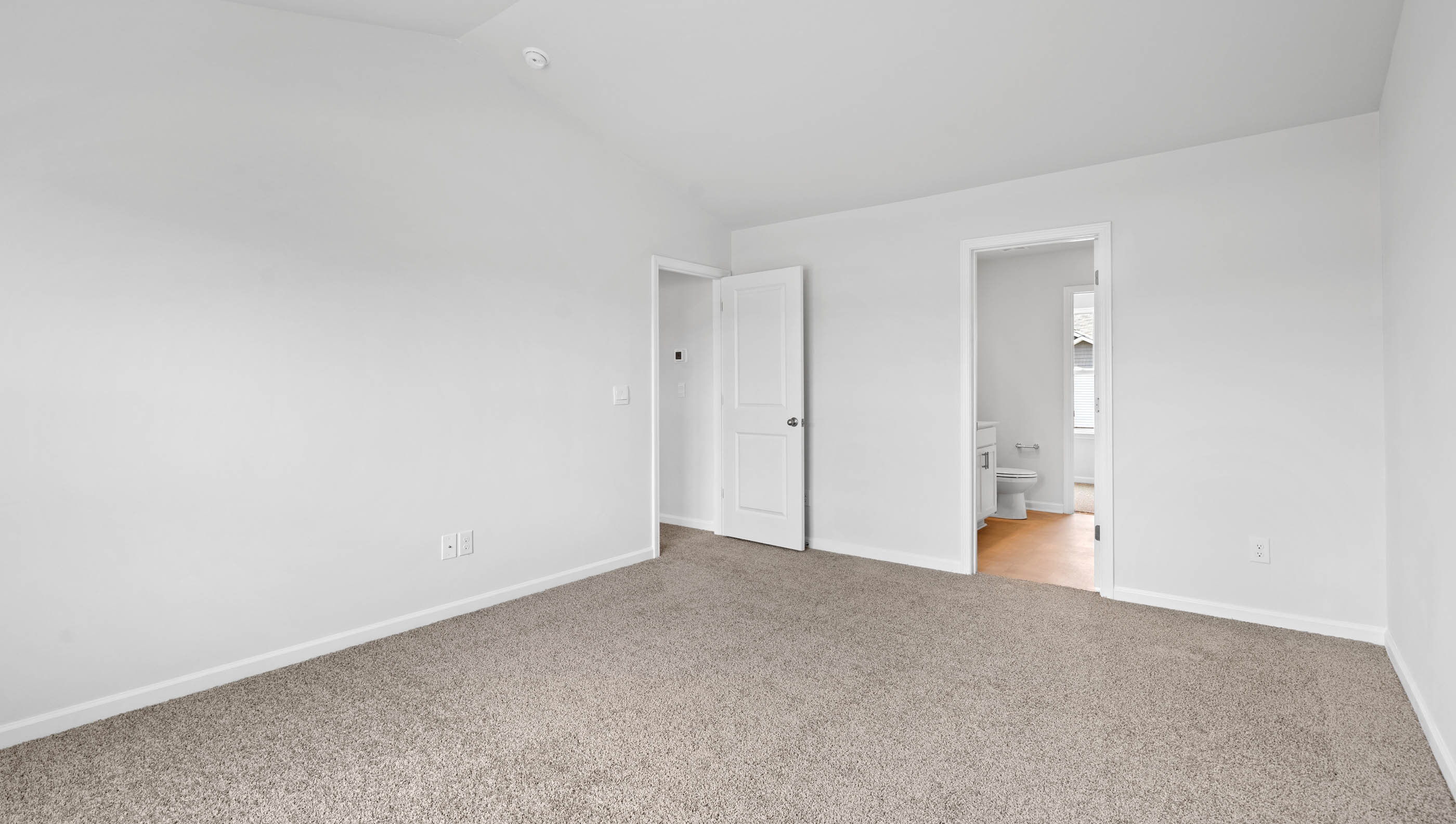 Large room with carpet.