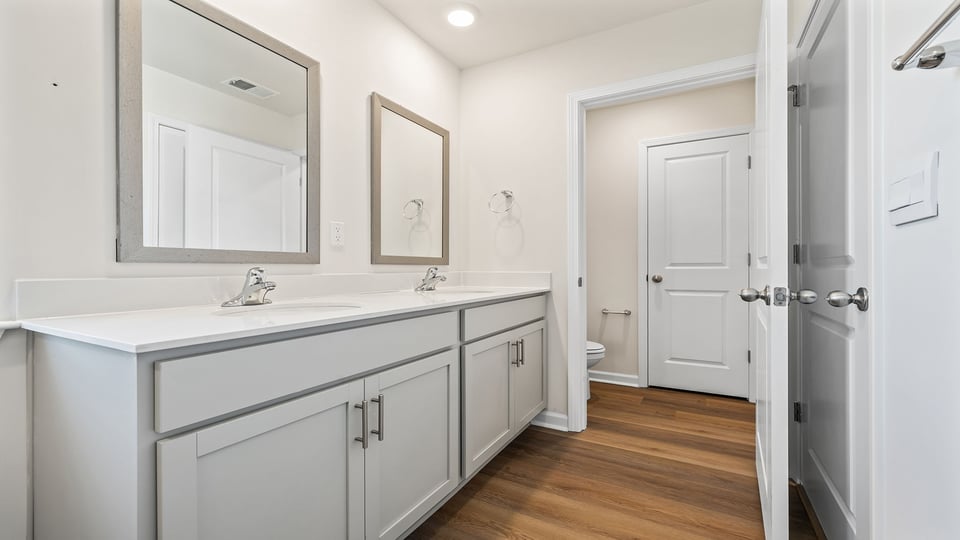 Bathroom with dual vanity.
