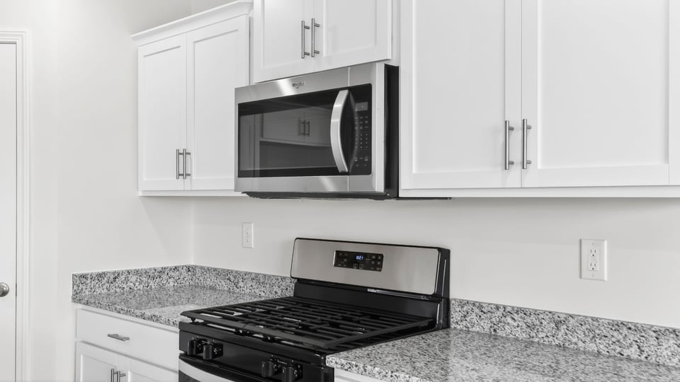 Gas range and microwave.