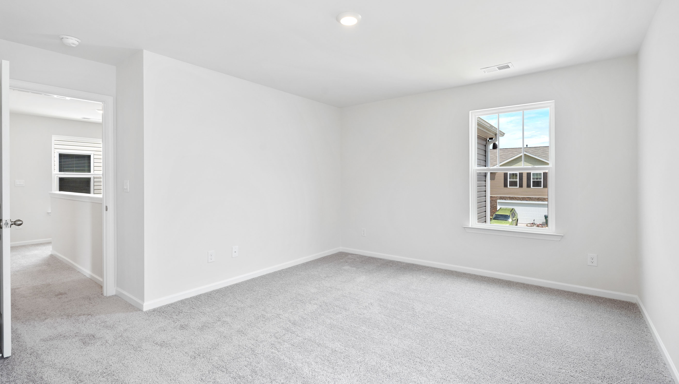 Bedroom with carpet.
