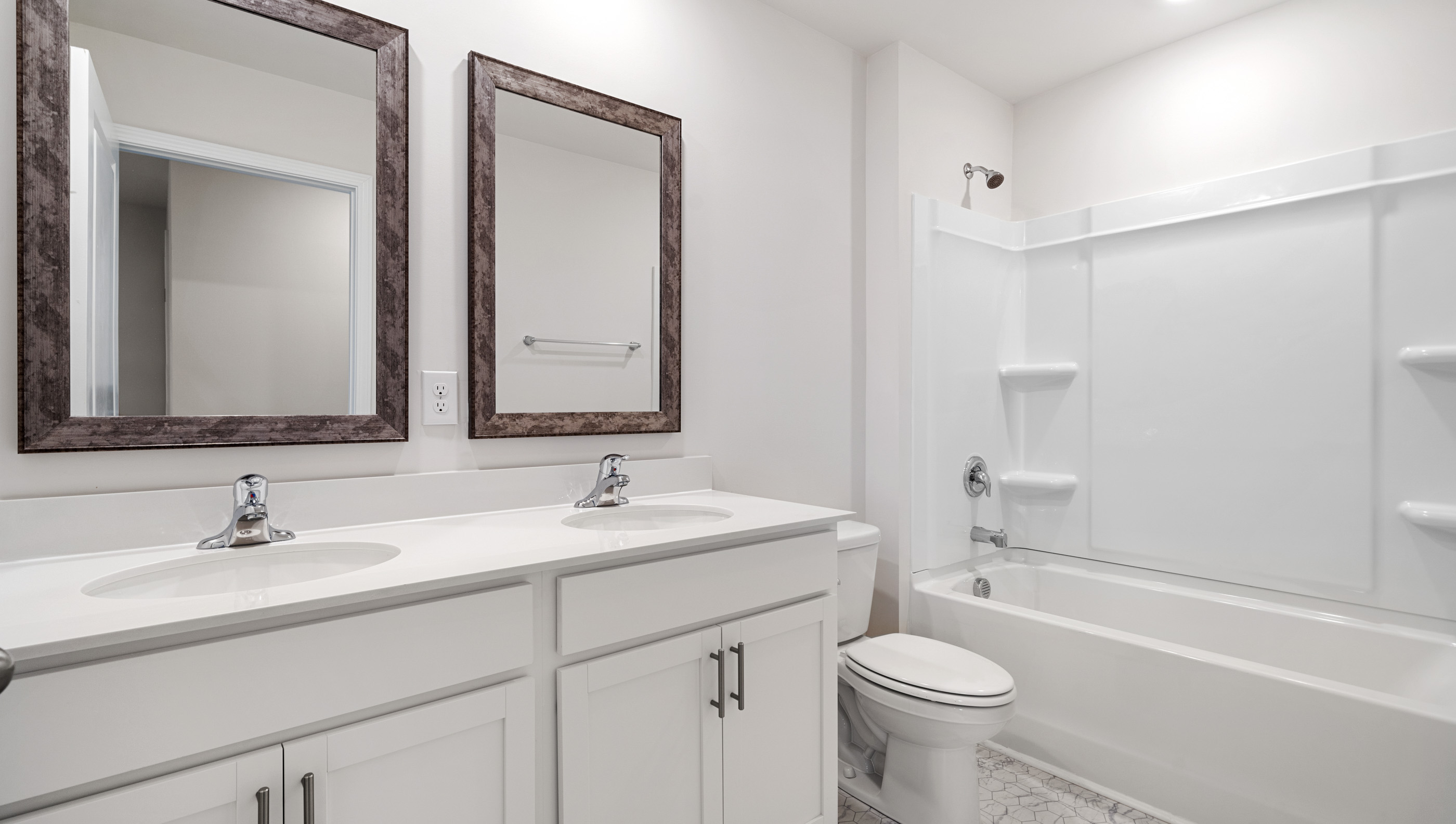 Bathroom vanity double sink with tub.