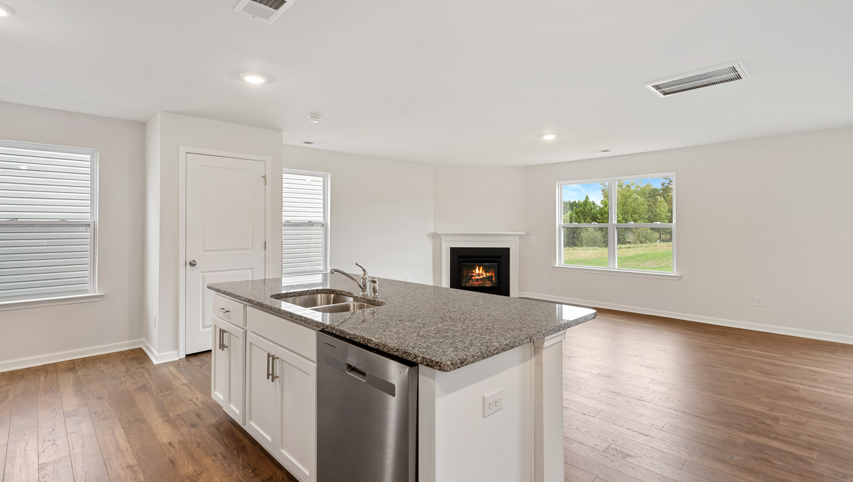 Kitchen island with view of family room.