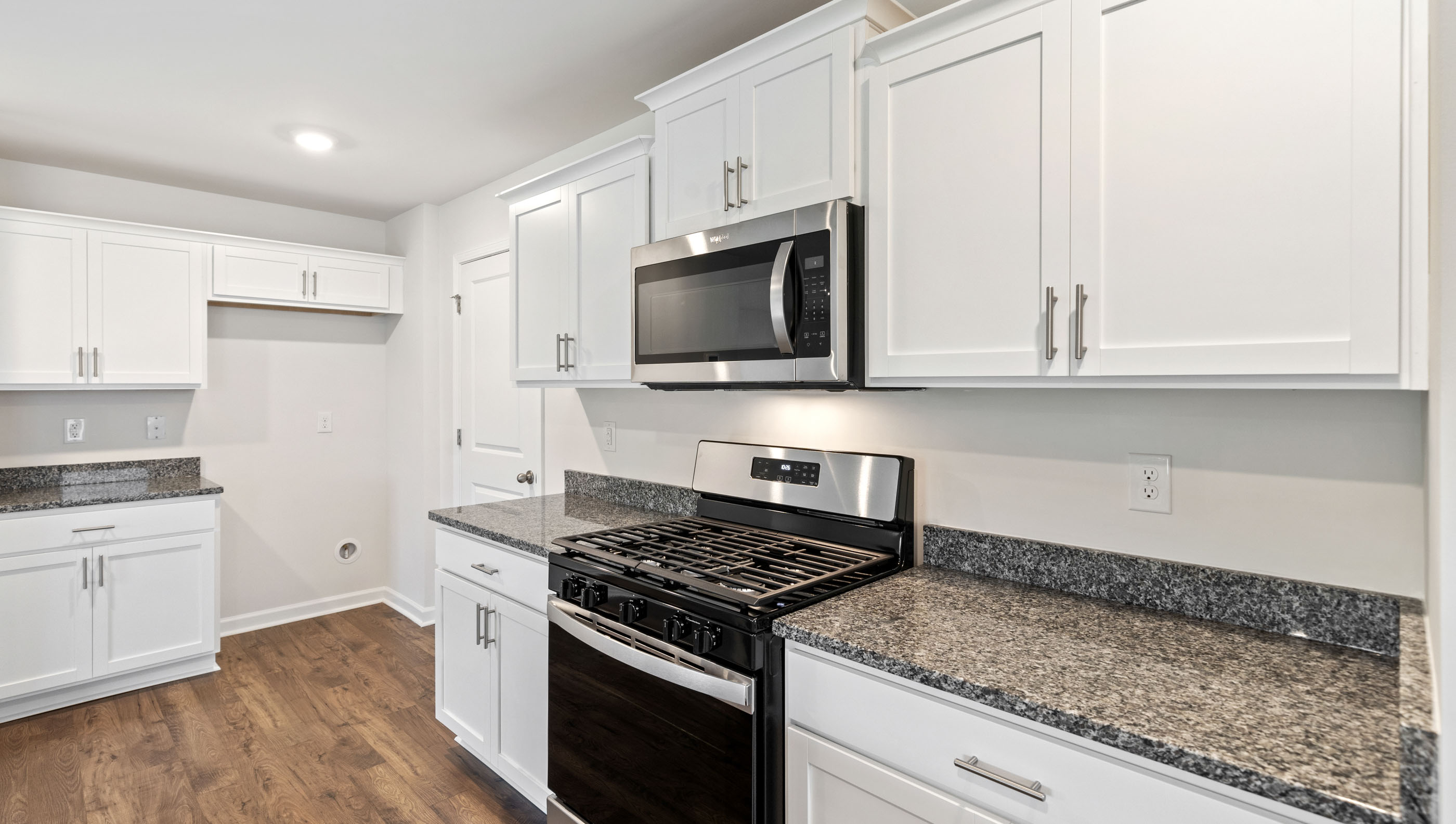 Kitchen with stainless steel appliances.