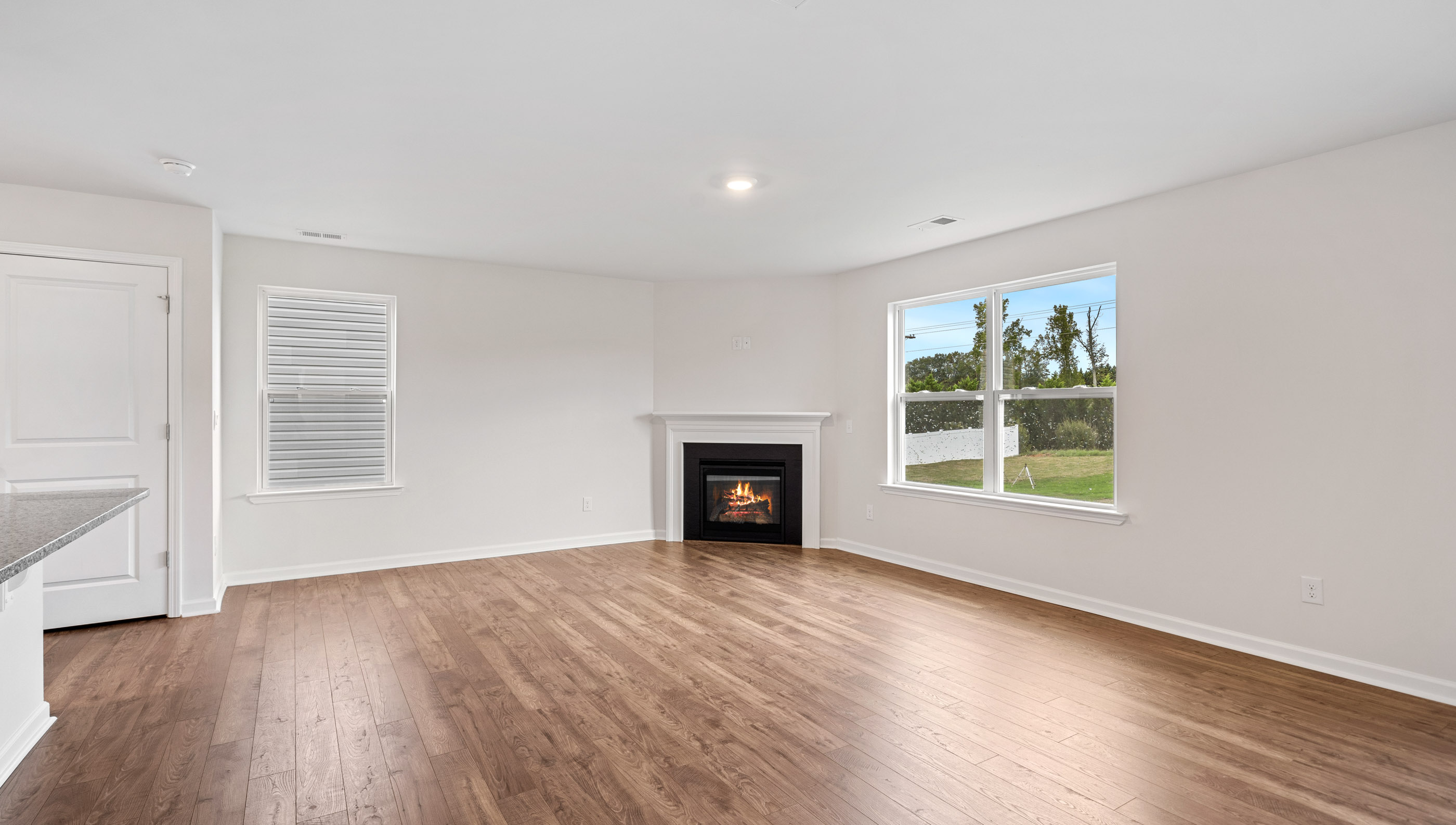 Family room with fireplace.
