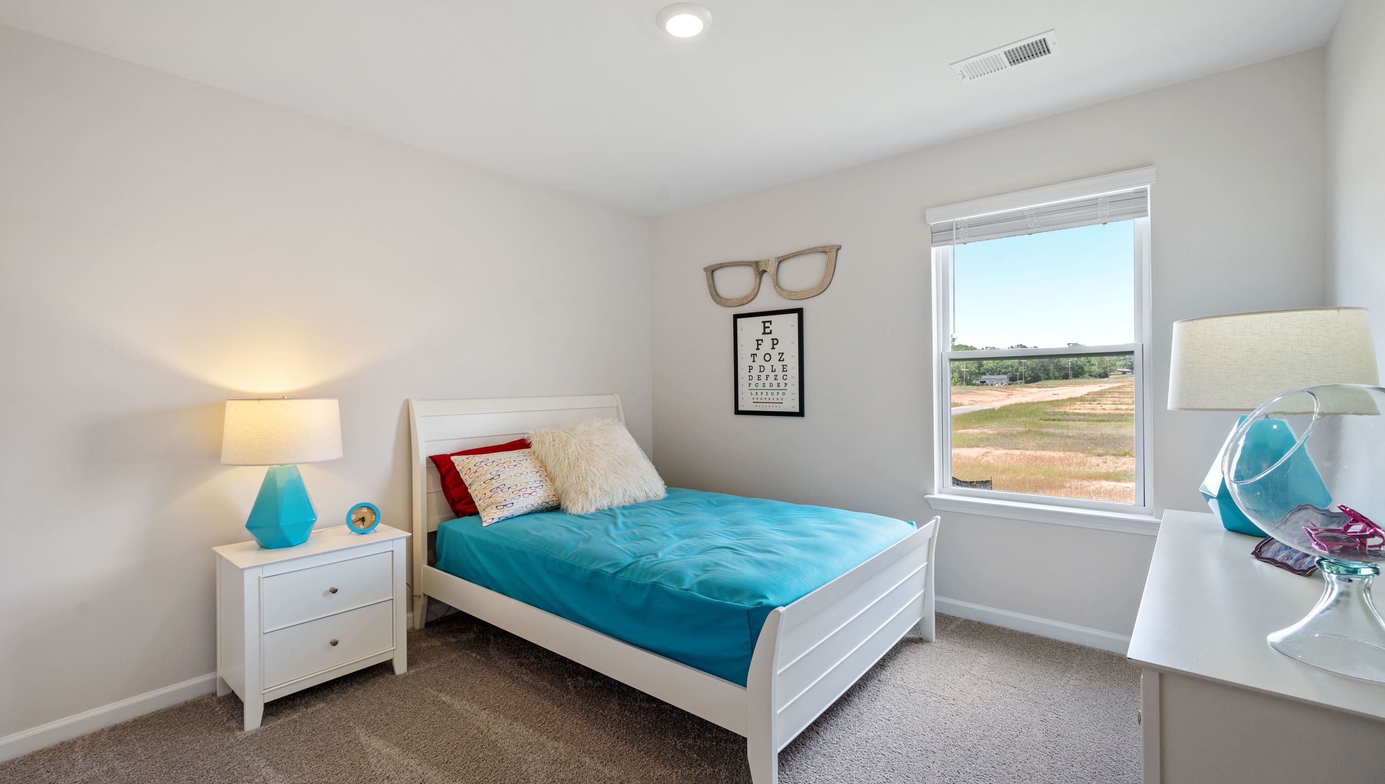 Room with carpet and window.