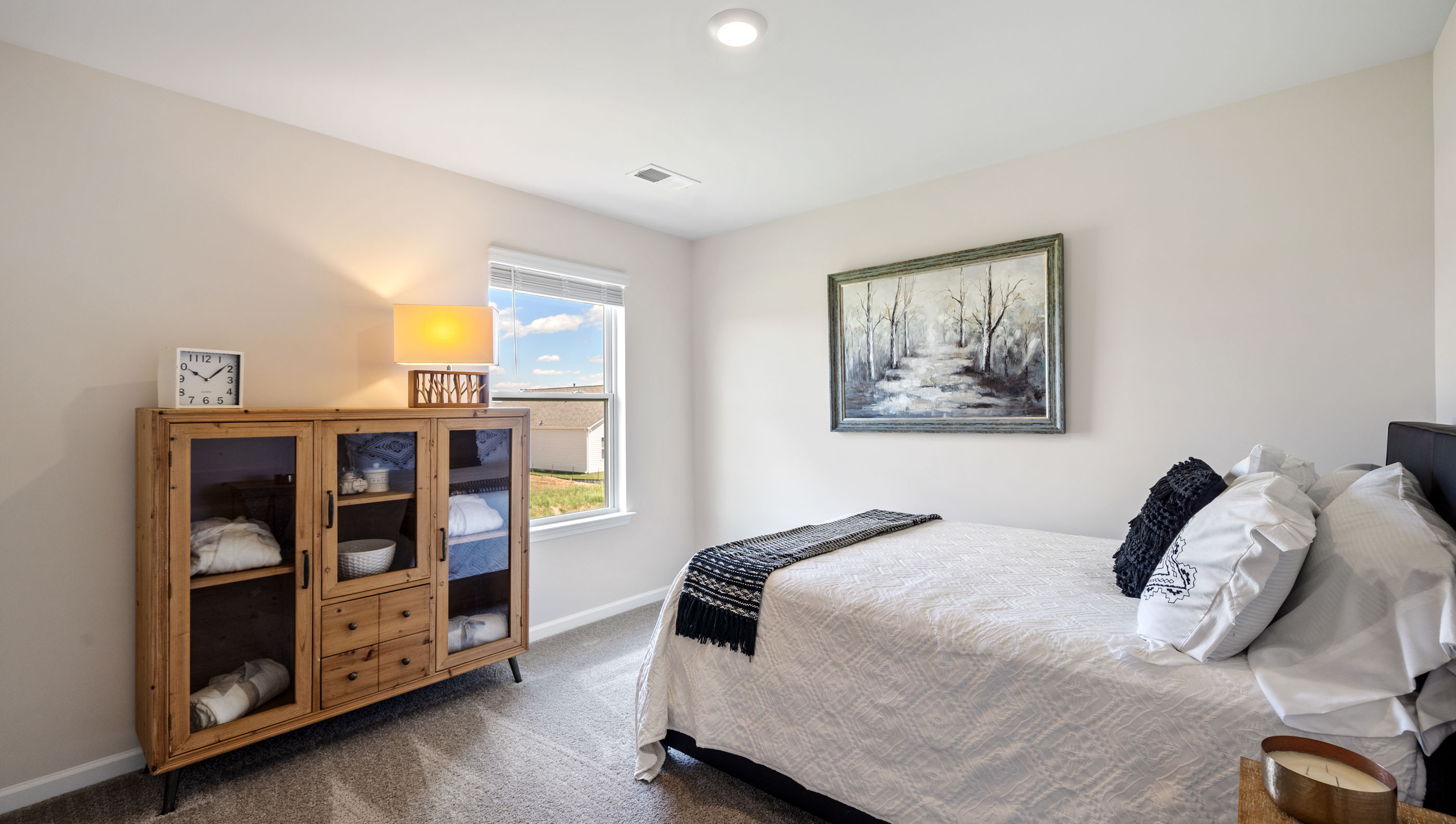 Room with carpet and window.