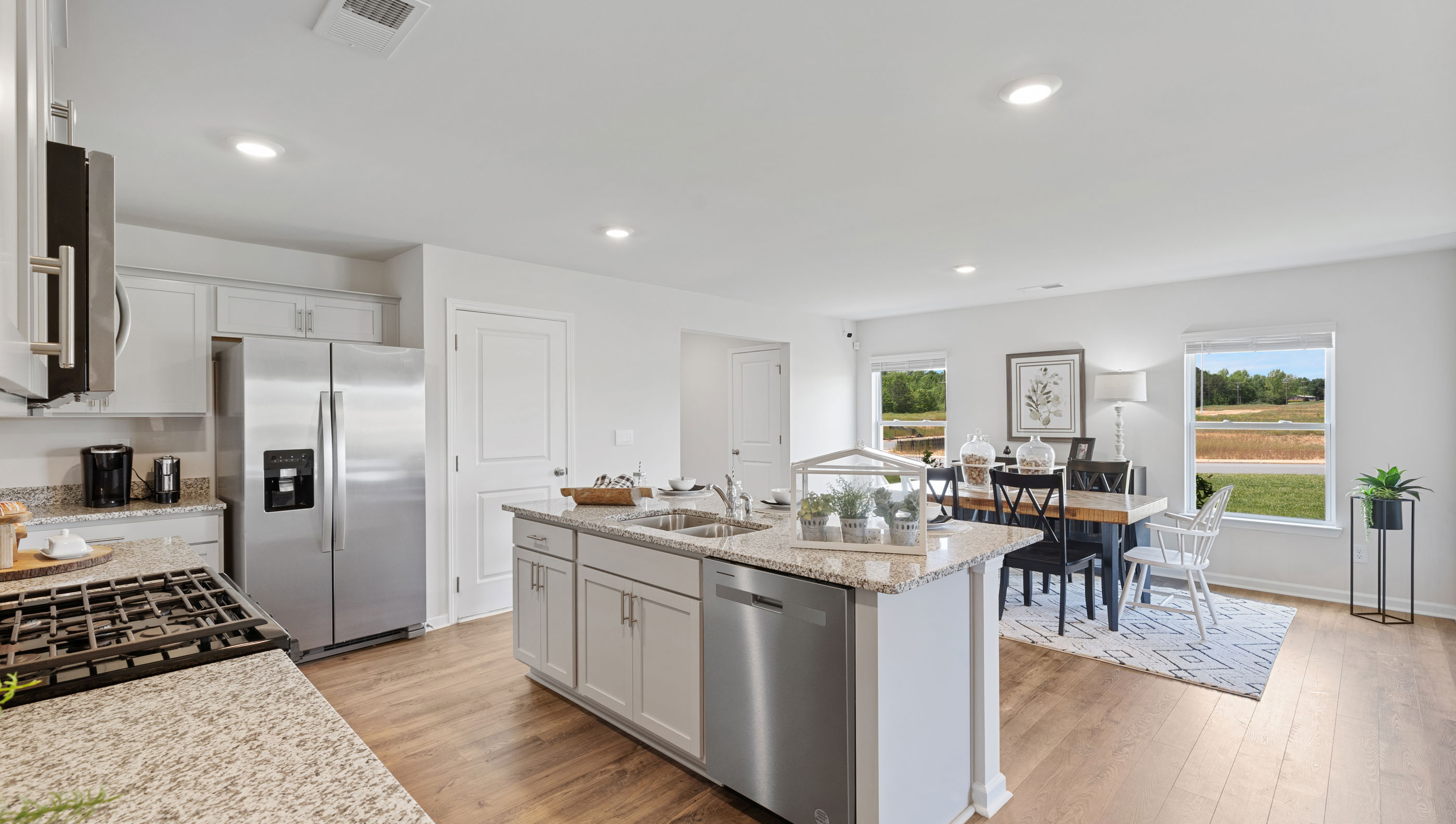 Kitchen with Large island and view of dining room.