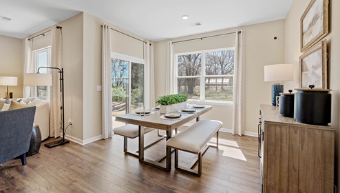 Family room with windows and fireplace.