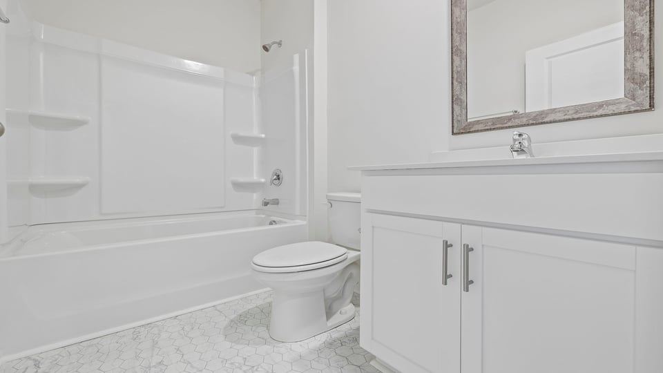 Bathroom with sink and tub.