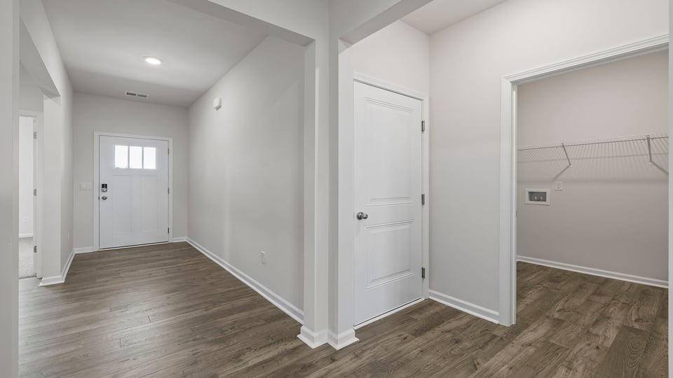 Hallway with view of rooms.