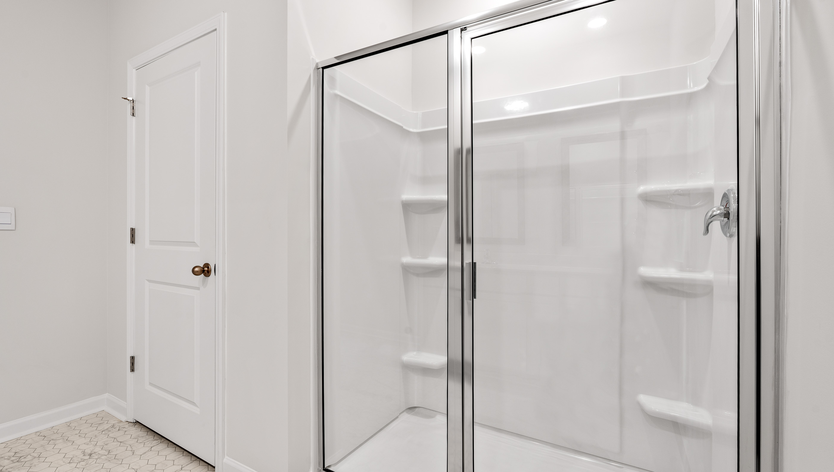 Primary bathroom with double vanity sinks.