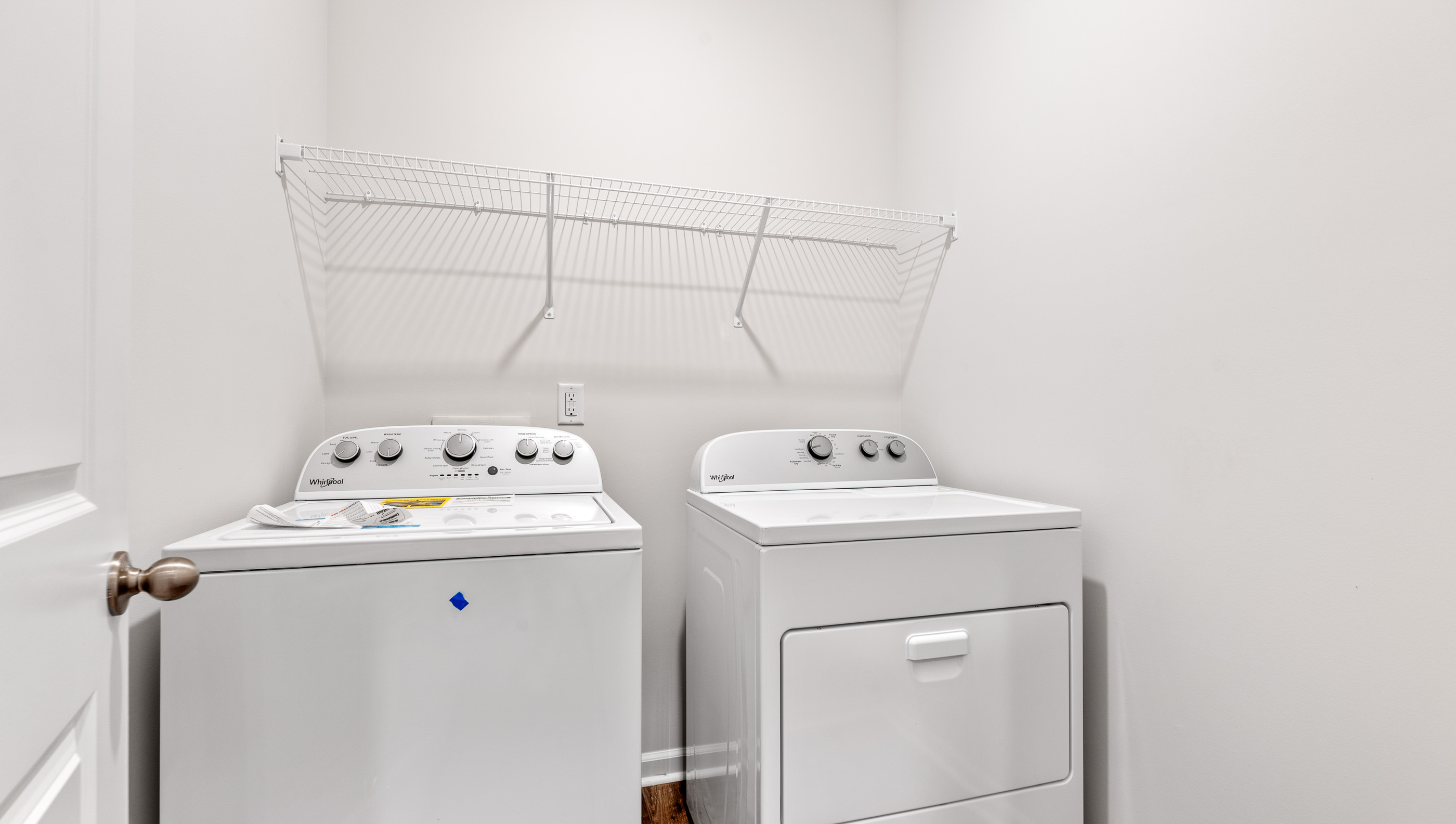 Walk-in laundry room.
