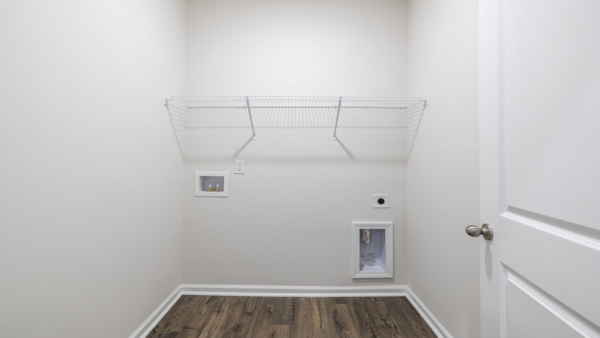 Walk-in laundry room.