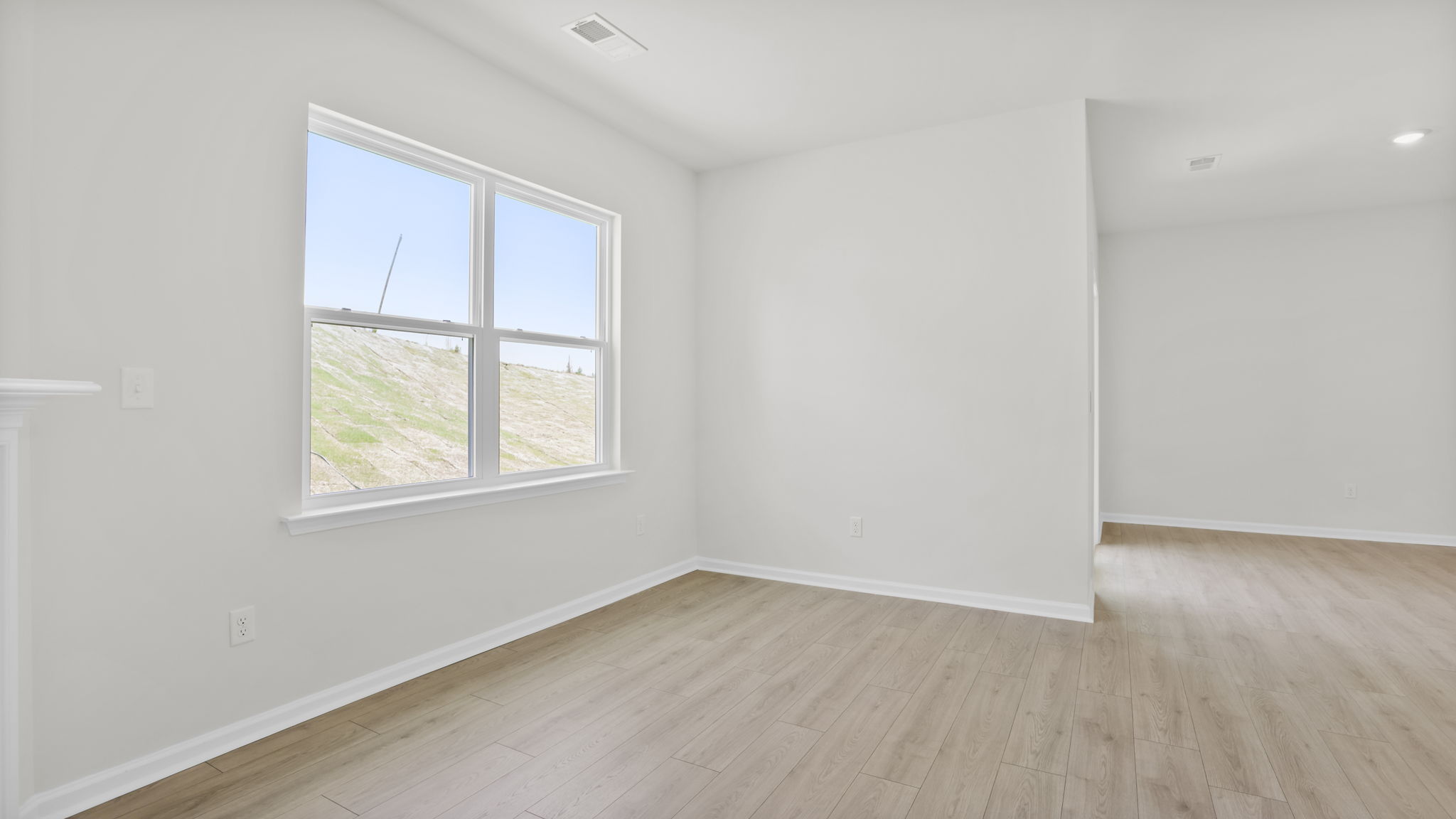 Family room with windows.
