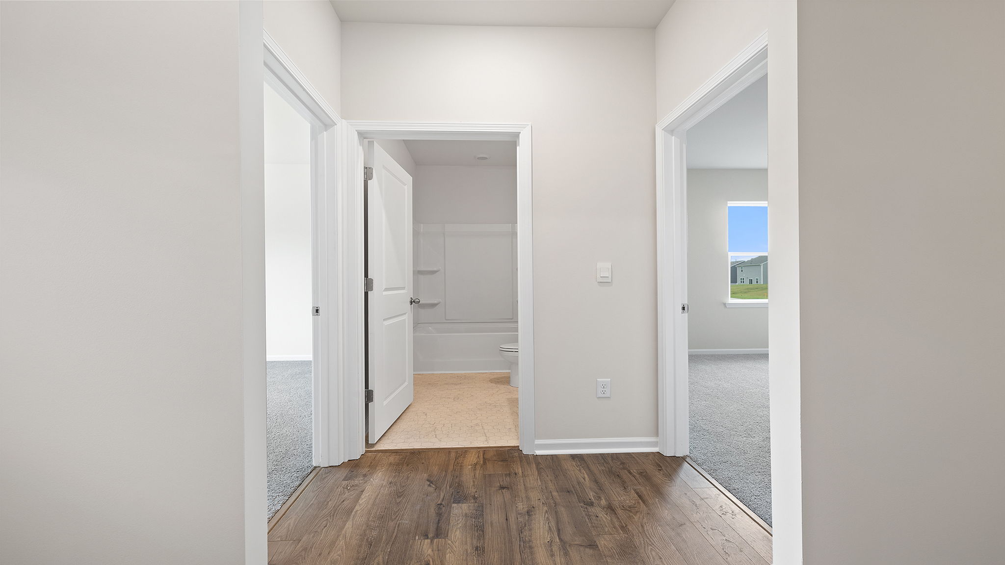 View of hallway toward the bedrooms and hall bath.