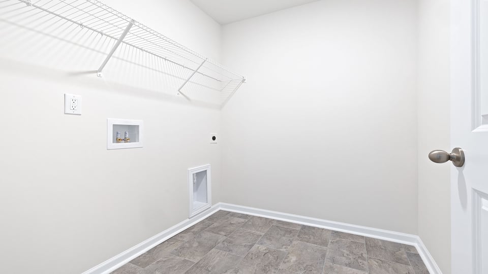 Laundry room with shelving.