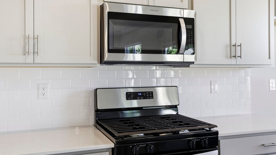 Kitchen with stainless steel appliances.