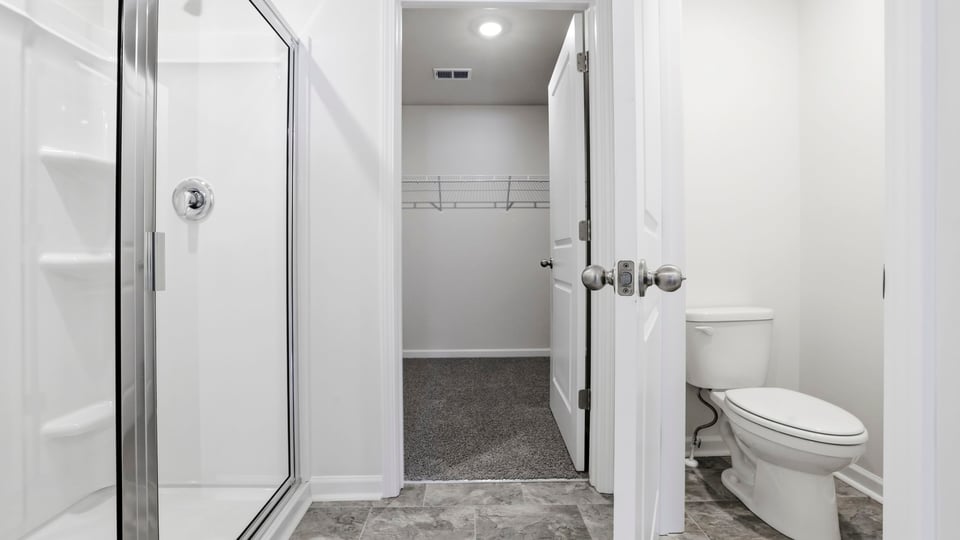Bathroom with walk in cloet.