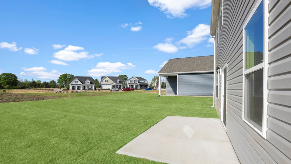 Patio with large backyard.