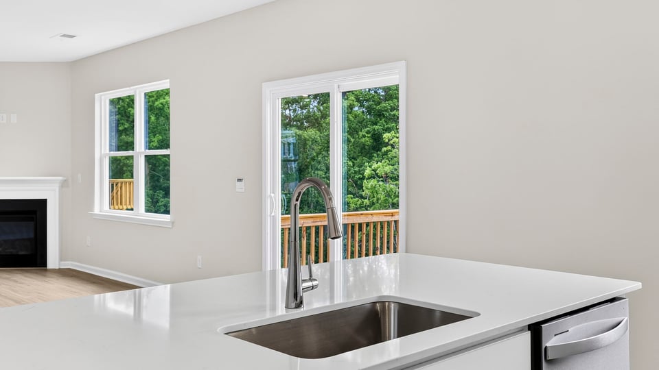 Kitchen with quartz countertops.