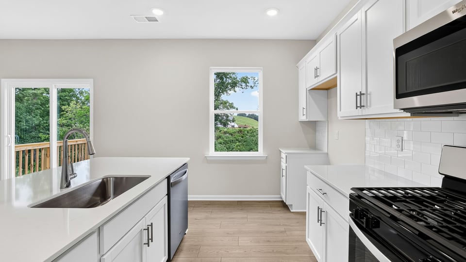 Kitchen with stainless steel appliances.