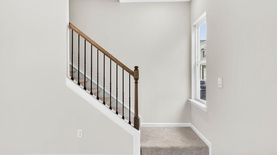 View of stairs to bedroom.