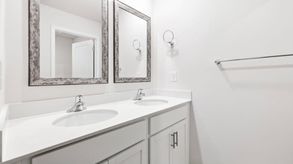 Bathroom with double vanity sinks.