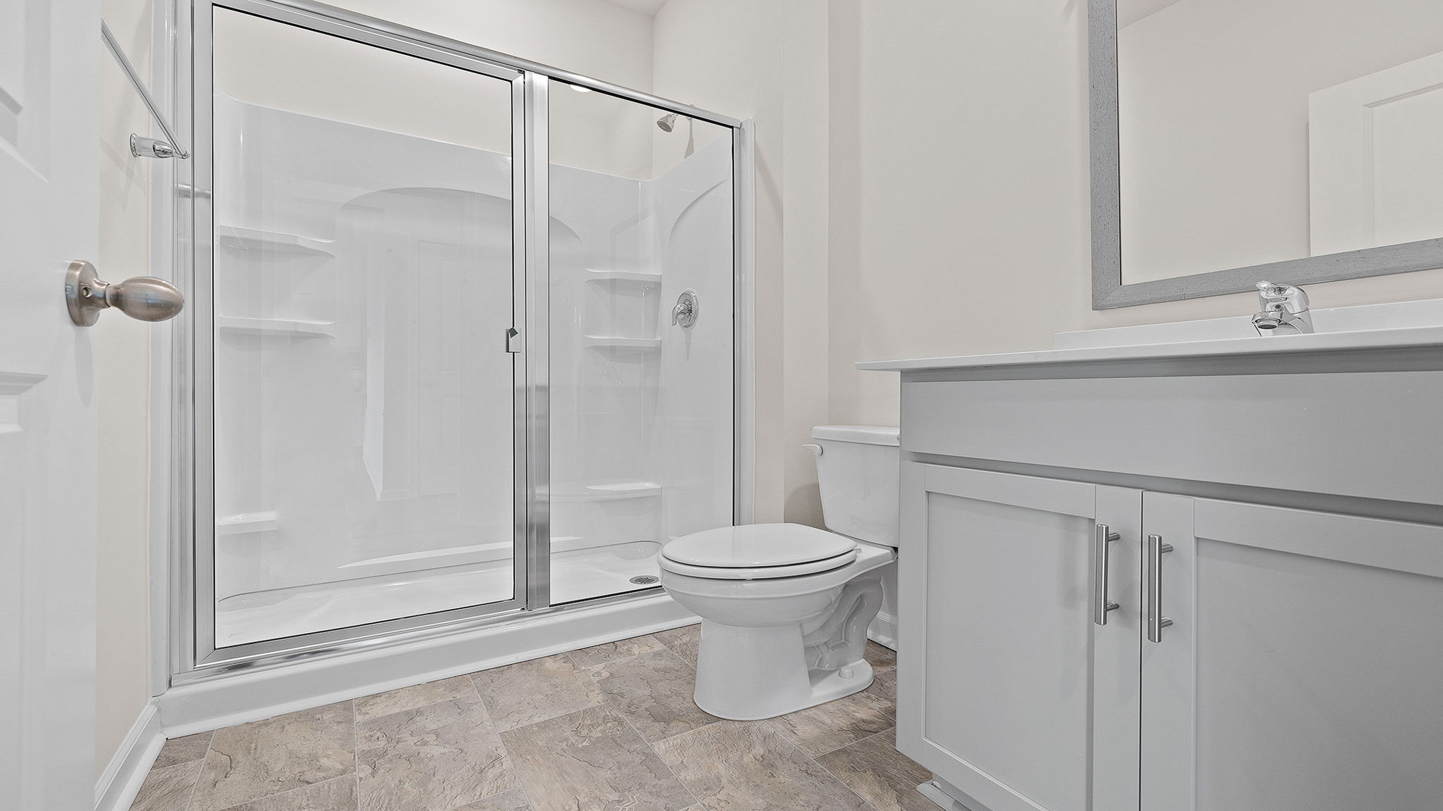 Bathroom with walk in shower.