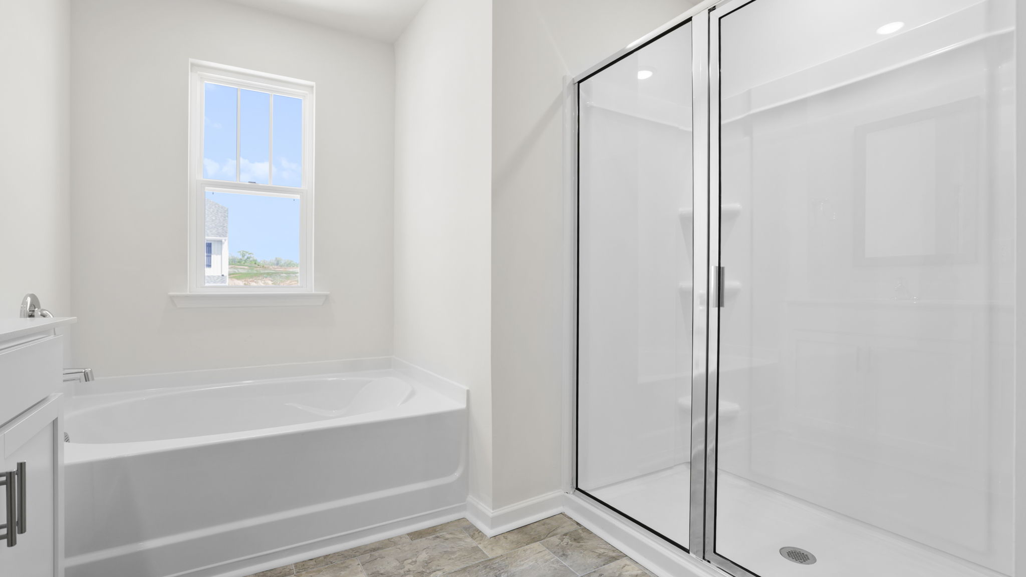 Bathroom with walk in shower.