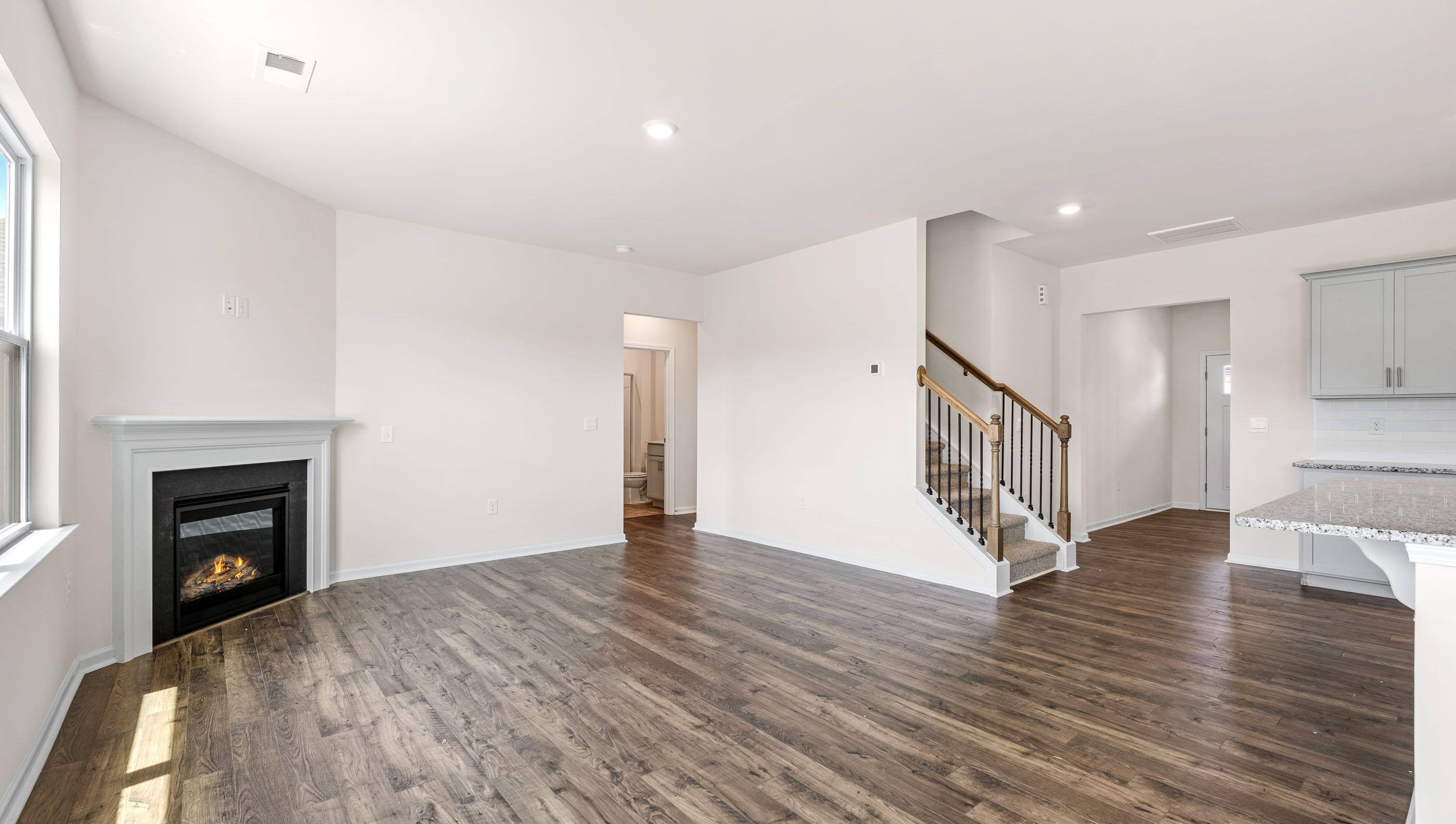 View of family room open to the kitchen.